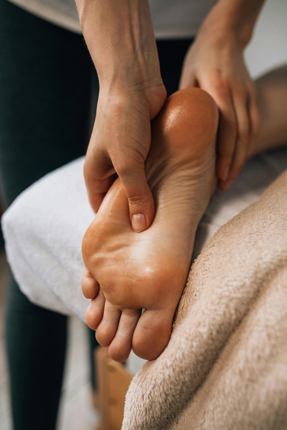 Fußmassage eines Kunden